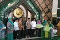 Penyerahan program bantuan rutilahu di Masjid Agung Ciamis.