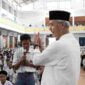 Ganjar Pranowo berdiri dihadapan ribuan santri Ponpes Darussalam Ciamis.