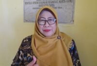 Dra. Hj Talbiyah Munadi,. S.H,. M.H.