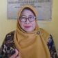 Dra. Hj Talbiyah Munadi,. S.H,. M.H.