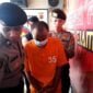 EN tersangka kasus kekerasan dan perbuatan cabul terhadap korban.