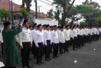 Upacara pelantikan dan pengambilan sumpah janji panitia ajudikasi PTSL.