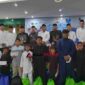 Kemenag Ciamis menyalurkan bantuan kepada ribuan anak yatim dan penyandang disabilitas.